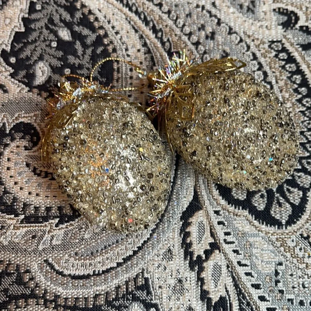 TWO LIGHT gold & bronze studded ornaments & fringe